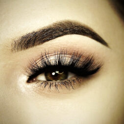 A close up of the eye with long lashes