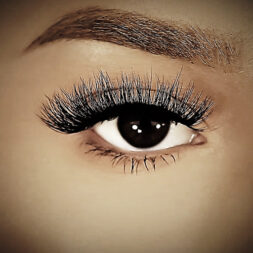 A close up of the eye with long eyelashes