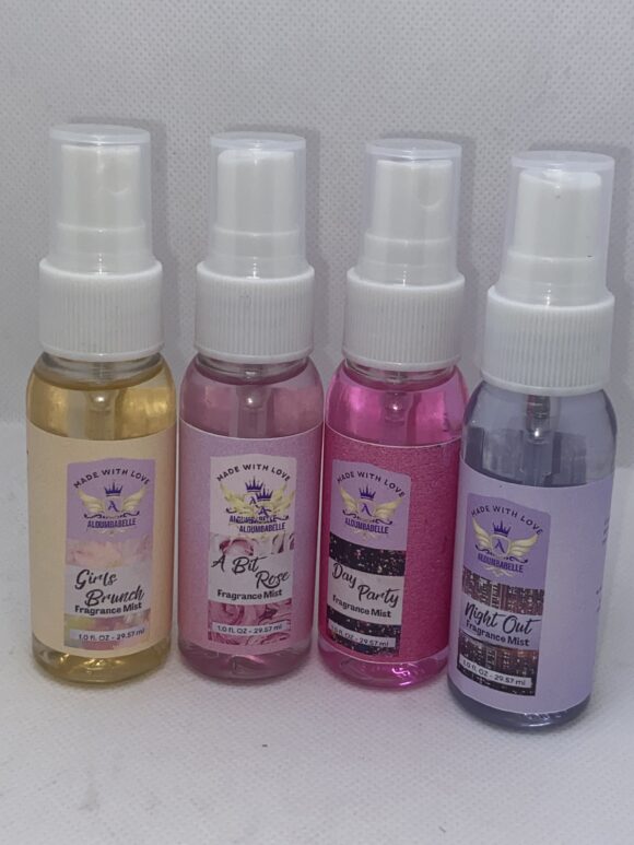 A group of four bottles with different fragrances.