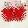 Red sunburst palm statement earrings with silver accents