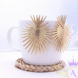 Gold sunburst palm statement earrings with spiked design