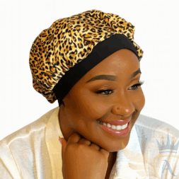Satin leopard print bonnet with black band for protective styling.