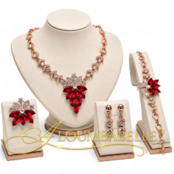 Clear crystal and red accent gold jewelry set with protective watermark logo