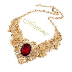 Luxury gold filigree necklace with ruby red gemstone pendant on white background