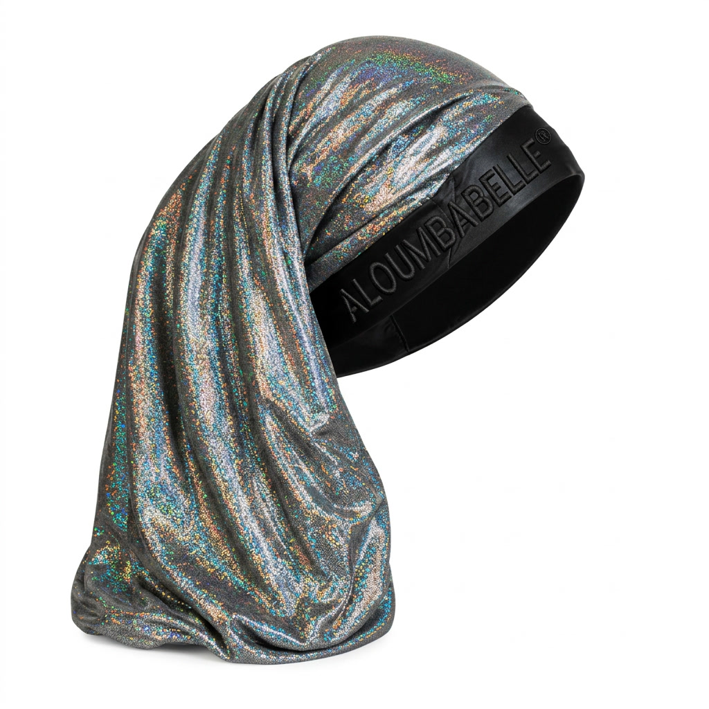 Ghost mannequin displaying a silver shimmer bonnet with a black satin band; ALOUMBABELLE visible as protective image branding and not confirmed as part of the physical bonnet design