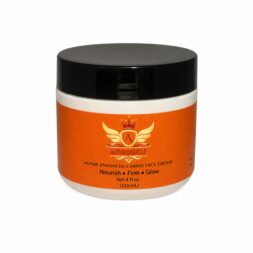 Nunde Enhanced Carrot Face Cream 4 fl oz jar with orange label and black lid on a white background.